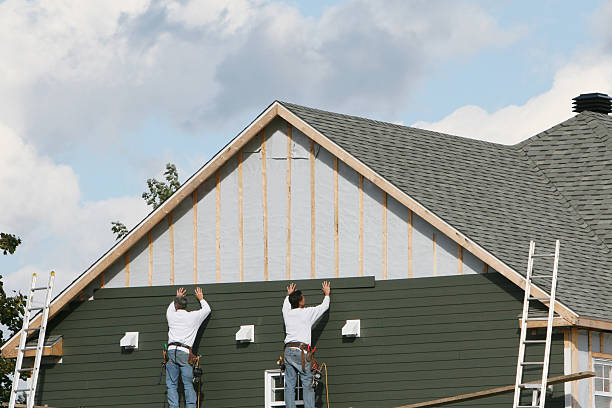 Professional Siding Replacement technician working in Winchester, VA